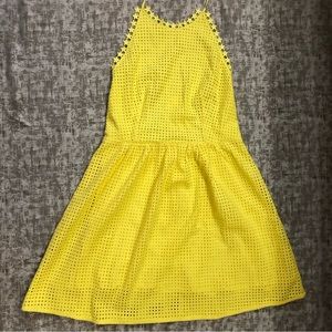 Brand-new The Korner yellow backless mini dress. Size small.